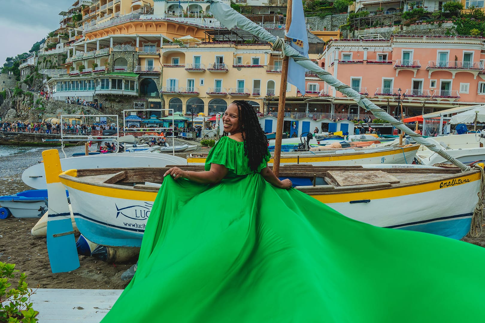 A woman on holiday in green dress at the Amalfi coast